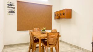 Neat and comfortable dining area at Vasantha’s Home Stay by Le Hotel Host in Thillainagar, Trichy
