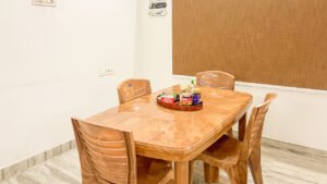 Neat and comfortable dining area at Vasantha’s Home Stay by Le Hotel Host in Thillainagar, Trichy